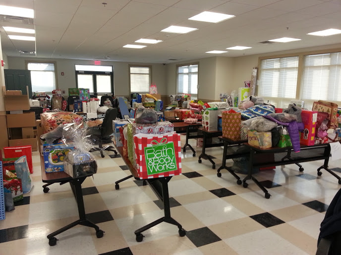 Christmas gifts donated to My Sisters’ Place from local companies and families. Gifts are sorted and given to MSP families on Christmas Eve.