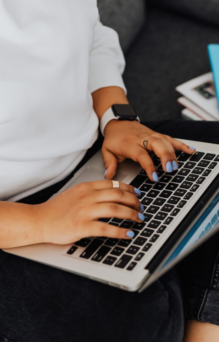 Laptop sitting in persons lap